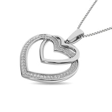 Load image into Gallery viewer, Diamond Duel Heart Pendant 1/10 ct tw in Sterling Silver