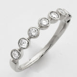 14KW 0.50CTW DIAMOND BAND - 7 STONE BEZEL SET